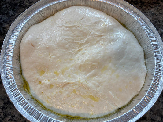 Raw sourdough focaccia dough ready to bake